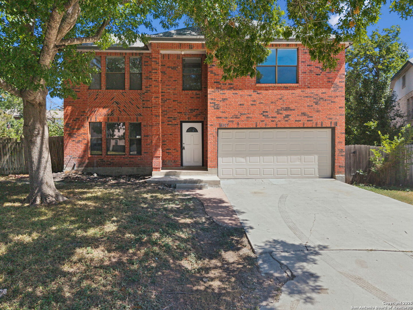 8127 Talkenhorn Converse, TX 78109 - Photo 35 of 57 a front view of a house with a yard