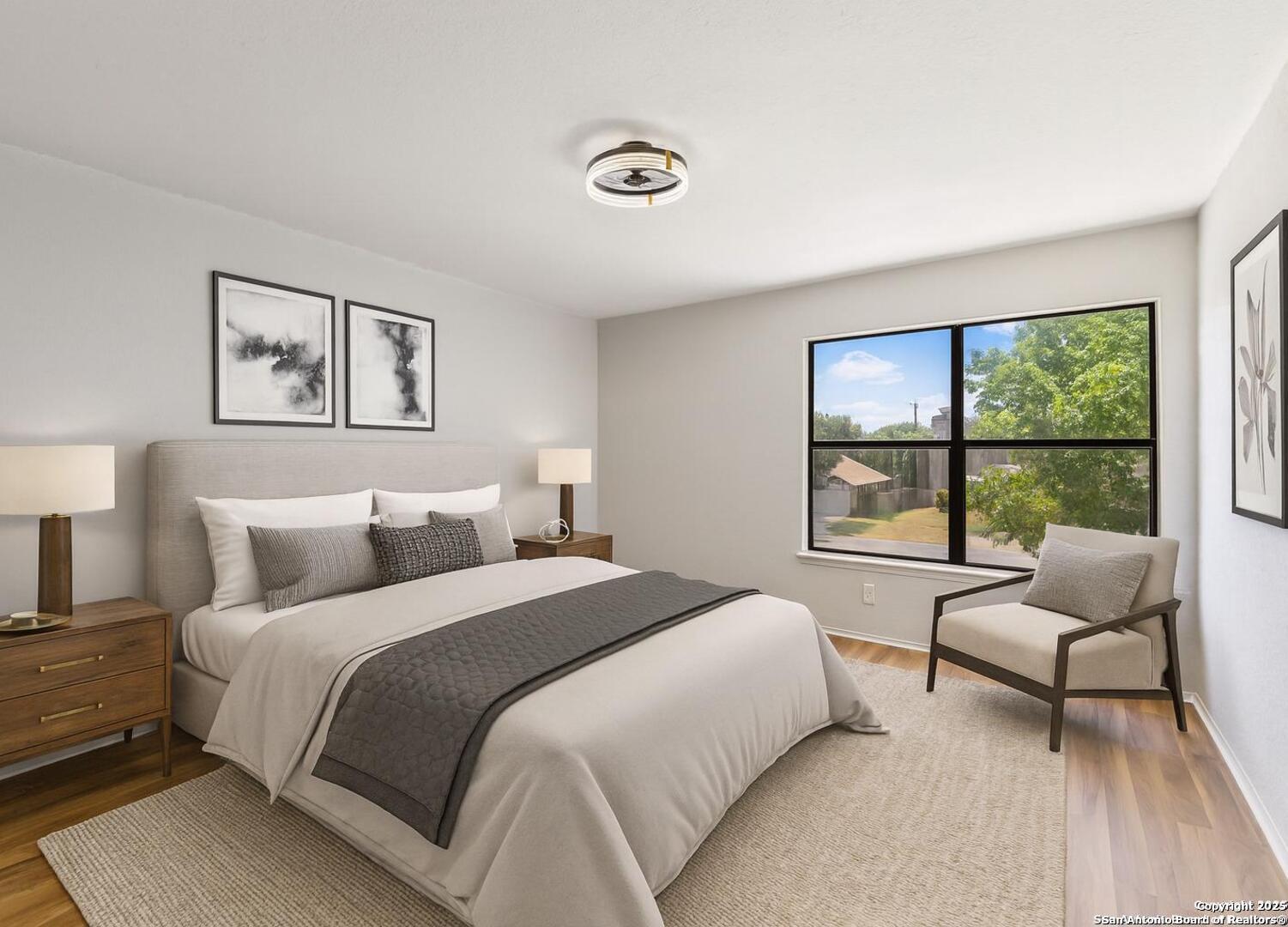 8127 Talkenhorn Converse, TX 78109 - Photo 38 of 57 a bedroom with bed and a couch