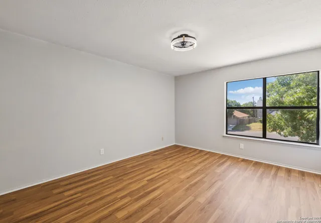 a stove top oven sitting inside of a kitchen