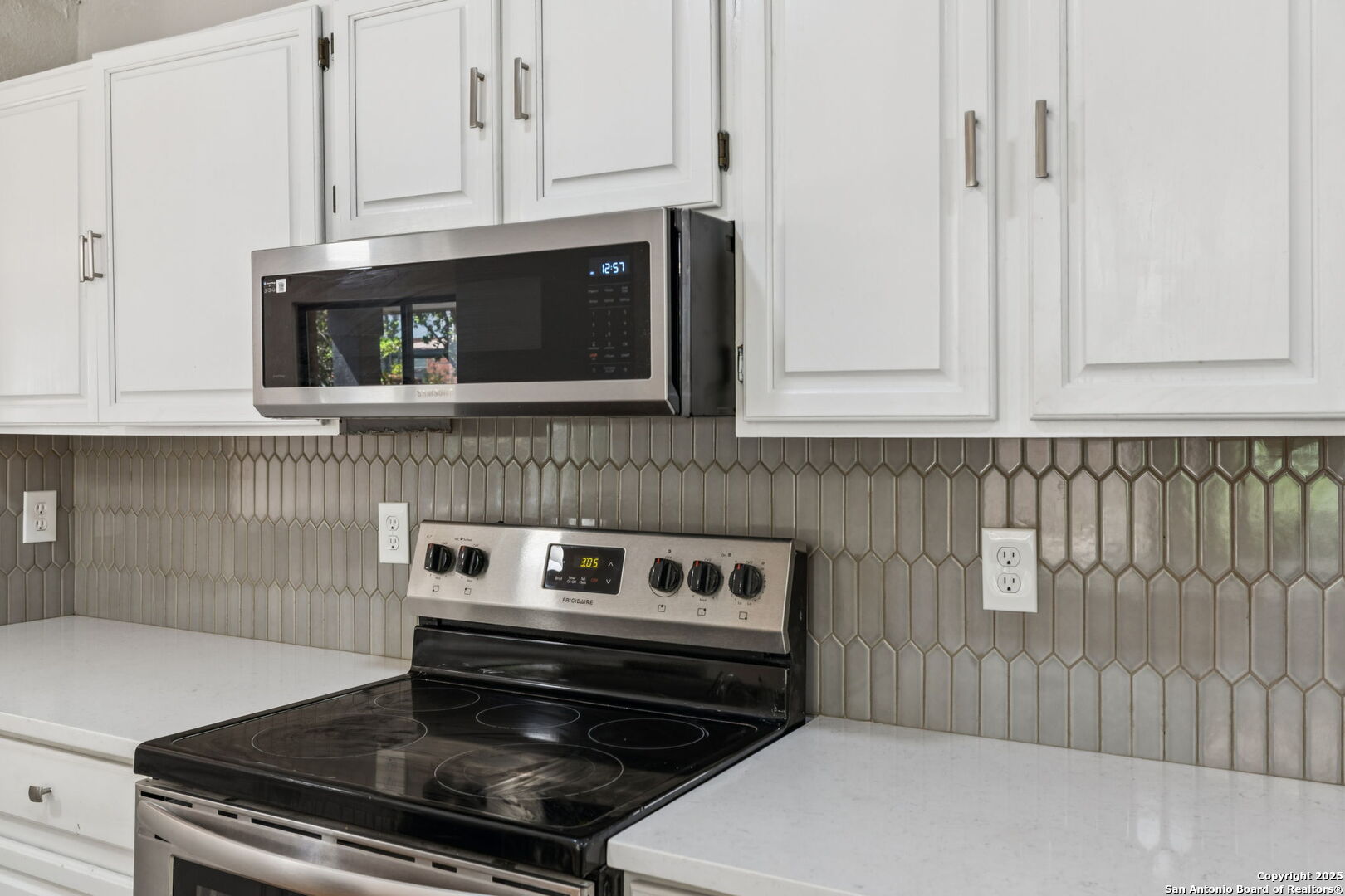8127 Talkenhorn Converse, TX 78109 - Photo 43 of 57 a stove top oven sitting inside of a kitchen