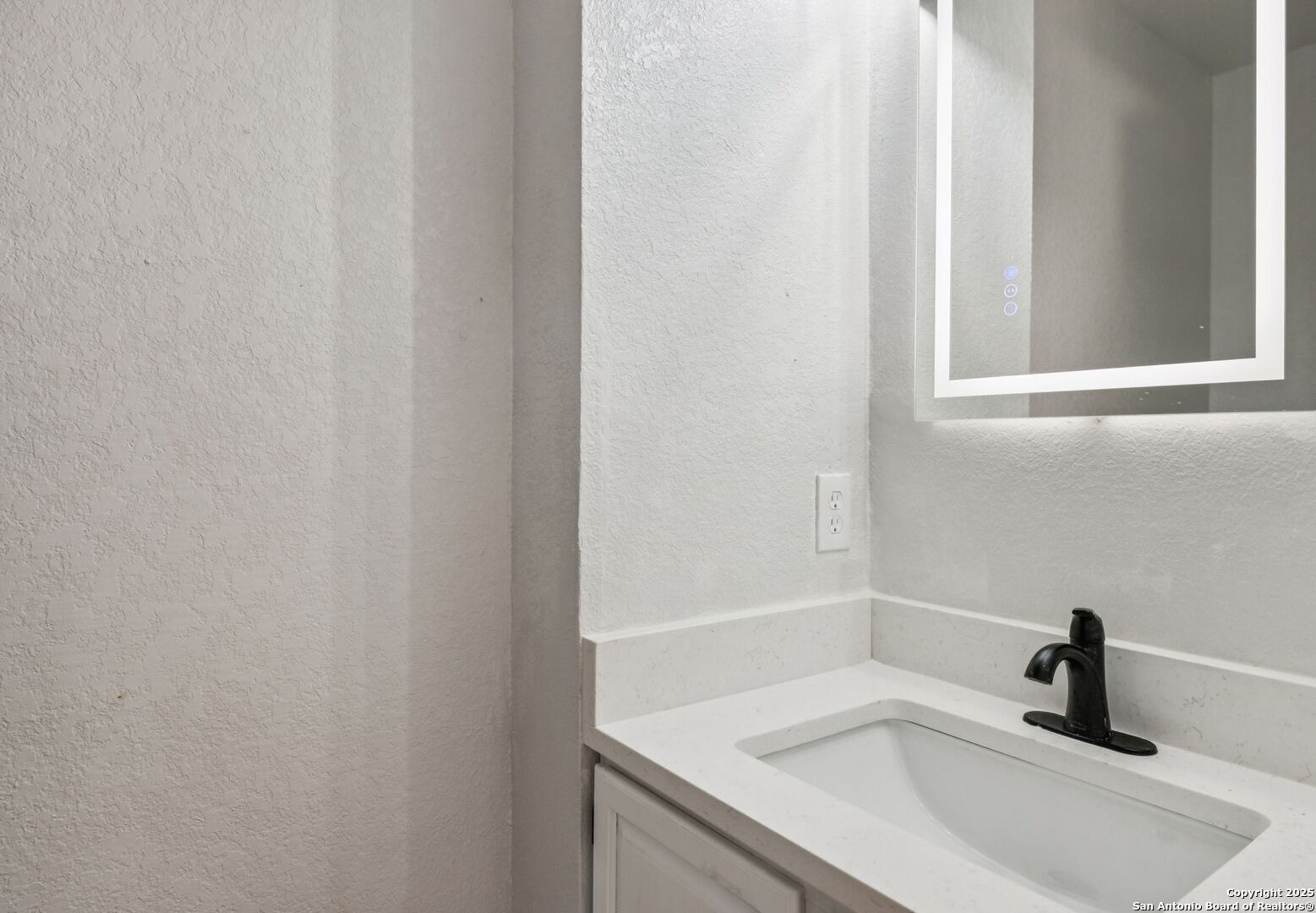 8127 Talkenhorn Converse, TX 78109 - Photo 47 of 57 a bathroom with a sink and vanity