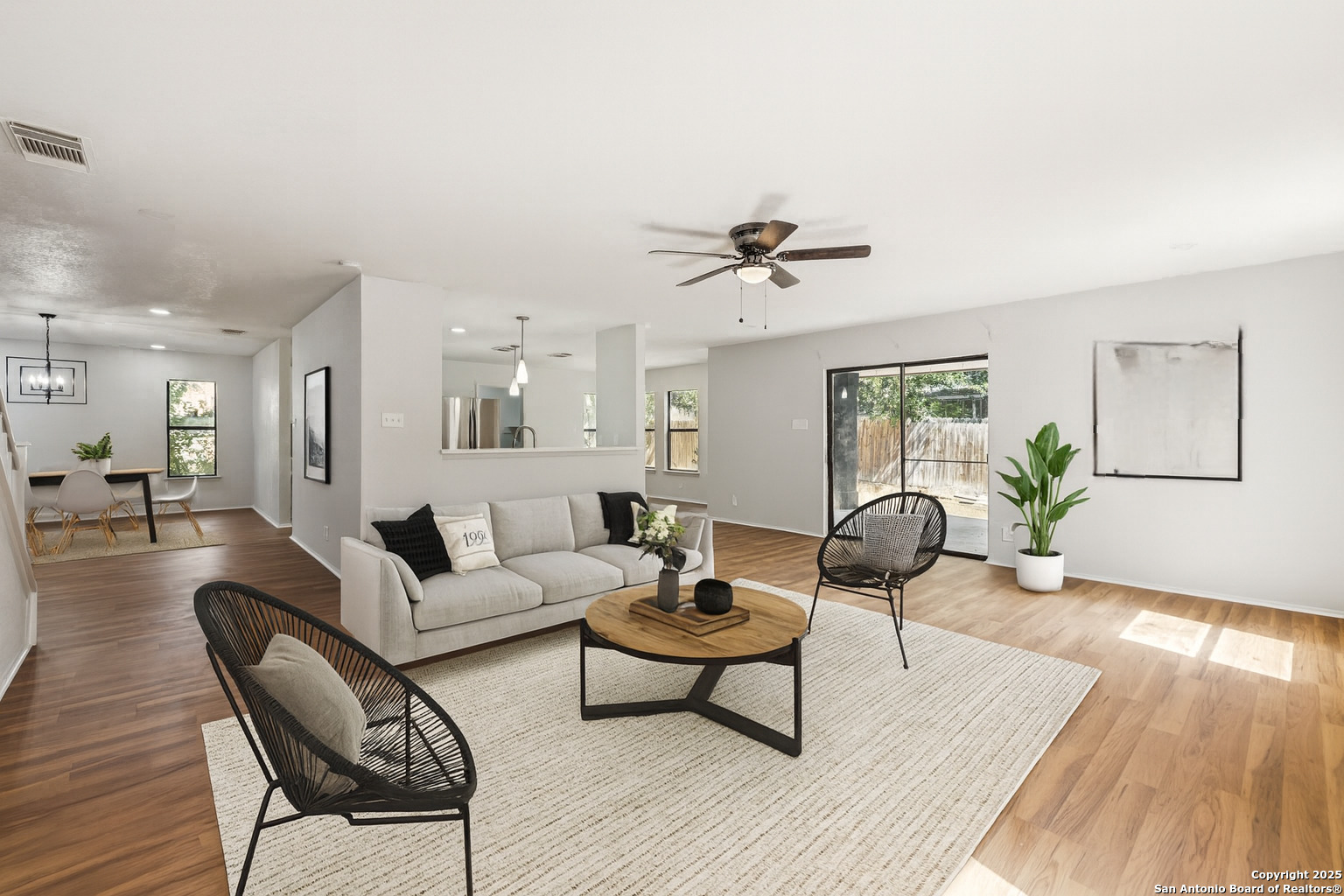 8127 Talkenhorn Converse, TX 78109 - Photo 5 of 57 a living room with furniture and a wooden floor