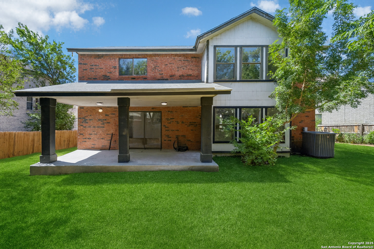 8127 Talkenhorn Converse, TX 78109 - Photo 54 of 57 a view of a house with a yard and a garden