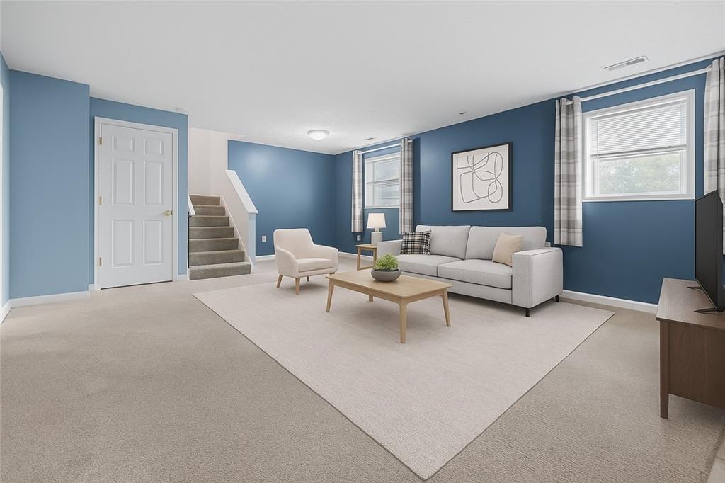 2432 West Hardies Road Gibsonia, PA 15044 - Photo 11 of 50 a living room with furniture and a window