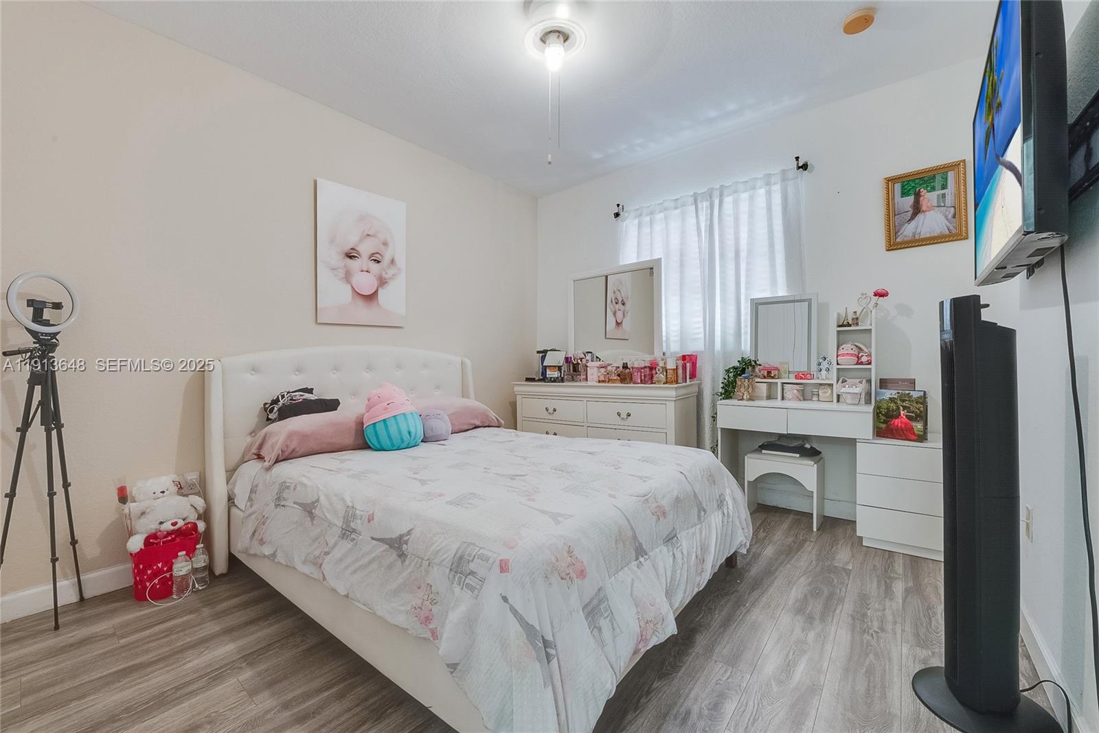 21441 Southwest 85th Path Cutler Bay, FL 33189 - Photo 12 of 17 a bedroom with a bed and a dresser