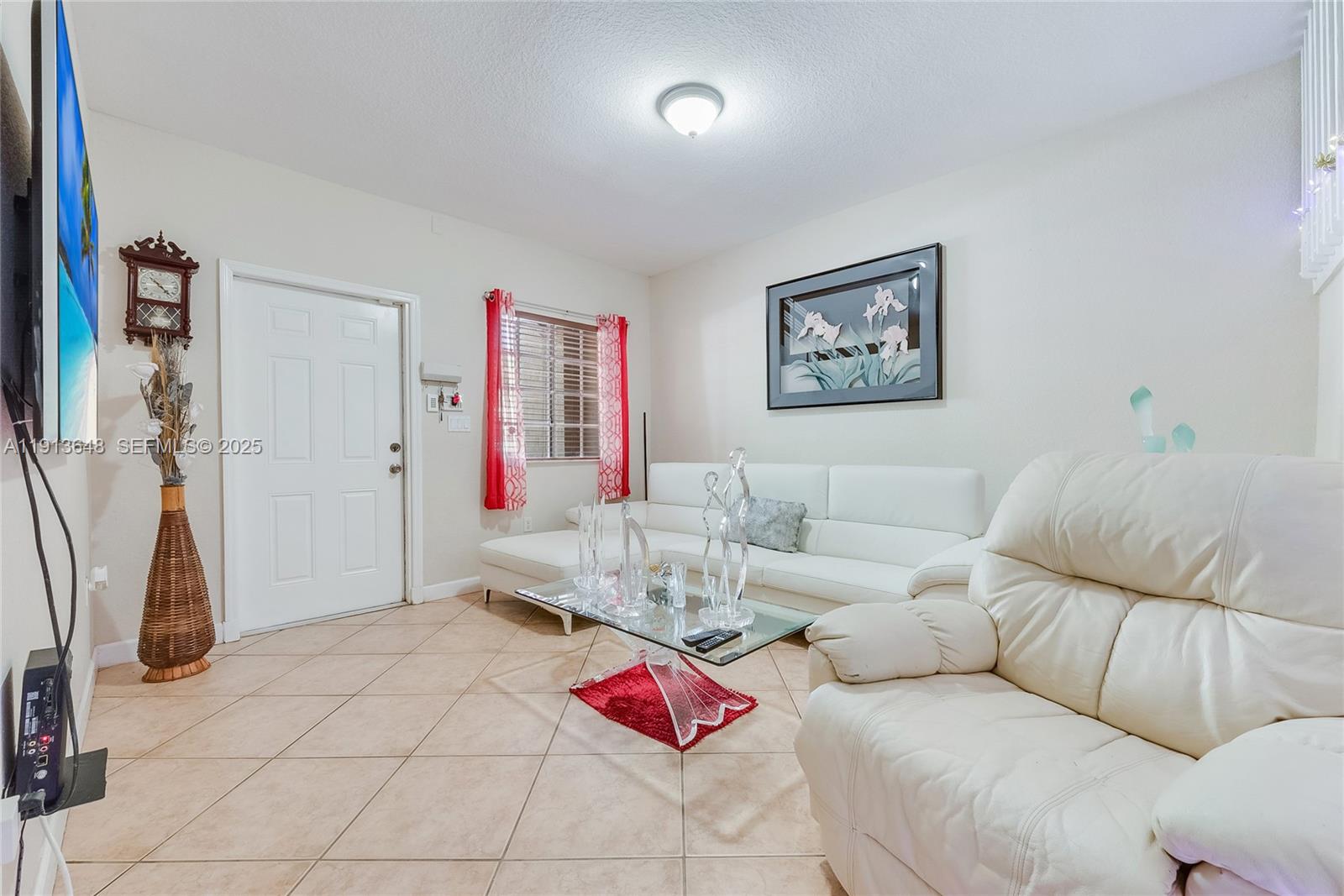 21441 Southwest 85th Path Cutler Bay, FL 33189 - Photo 4 of 17 a living room with furniture