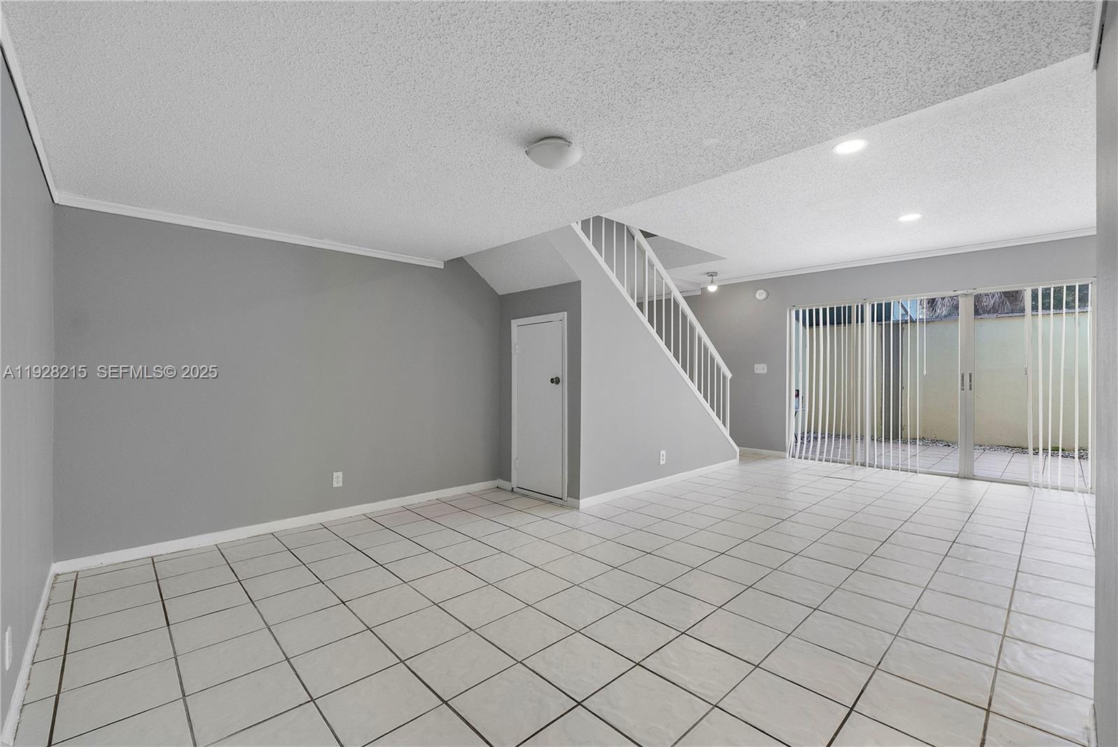 5850 Northwest 57th Avenue, Unit 1 Tamarac, FL 33319 - Photo 15 of 56 a view of an empty room