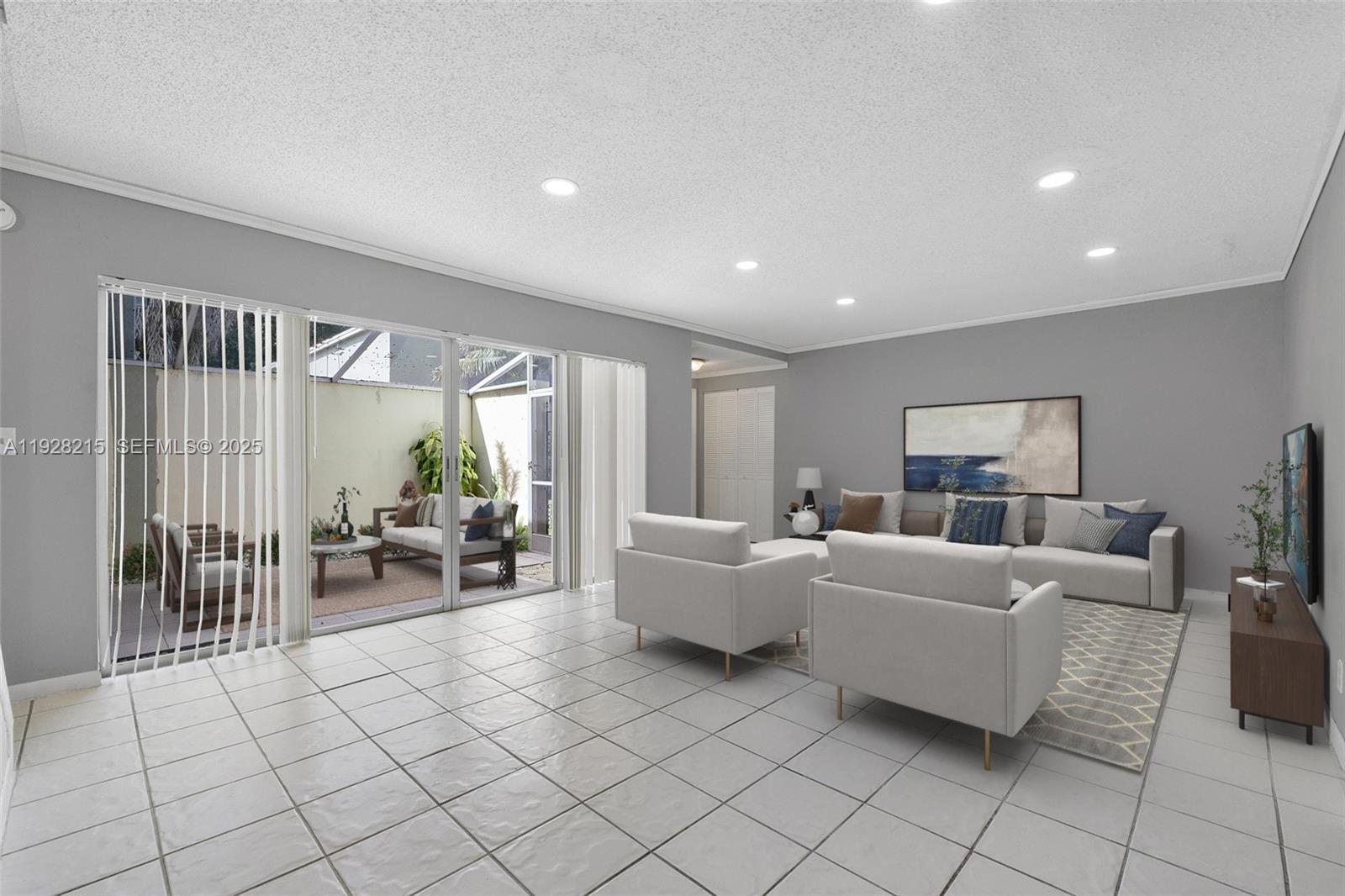 5850 Northwest 57th Avenue, Unit 1 Tamarac, FL 33319 - Photo 2 of 56 a living room with furniture and a floor to ceiling window