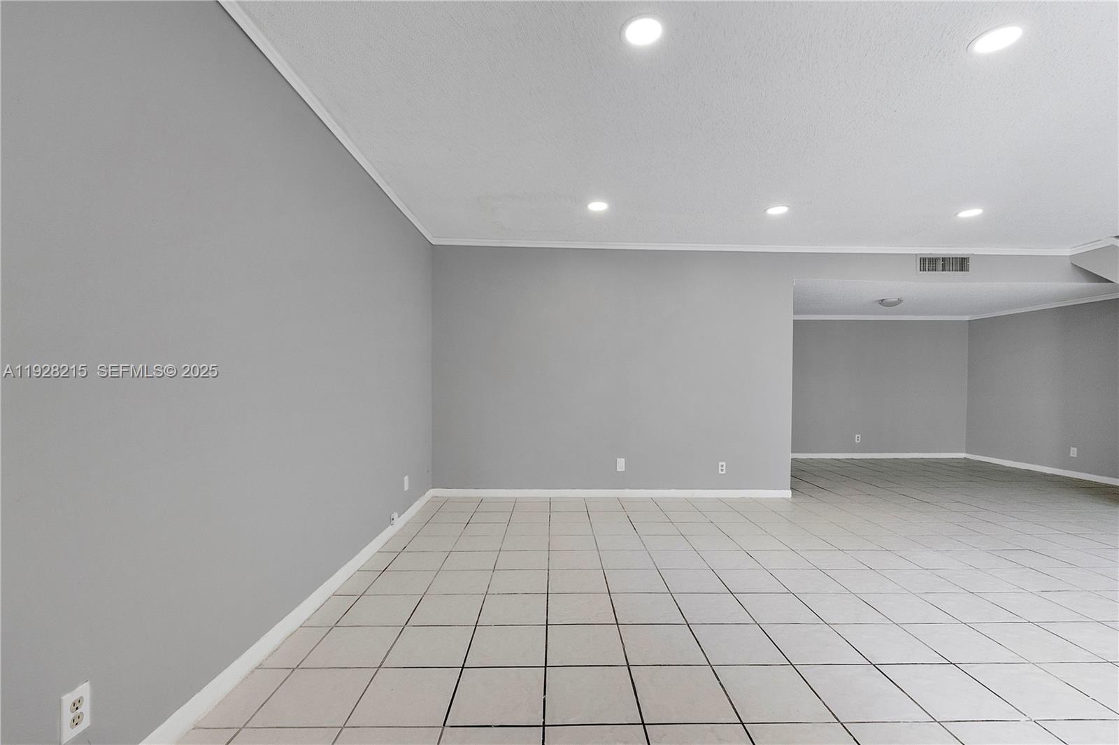5850 Northwest 57th Avenue, Unit 1 Tamarac, FL 33319 - Photo 24 of 56 a view of an empty room