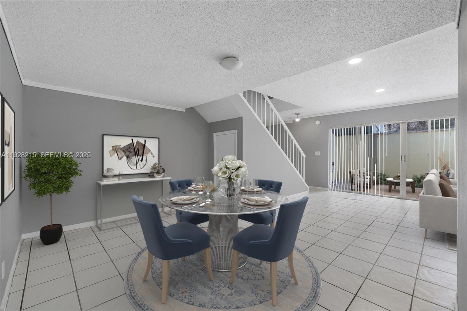 5850 Northwest 57th Avenue, Unit 1 Tamarac, FL 33319 - Photo 4 of 56 a dining room with furniture and window