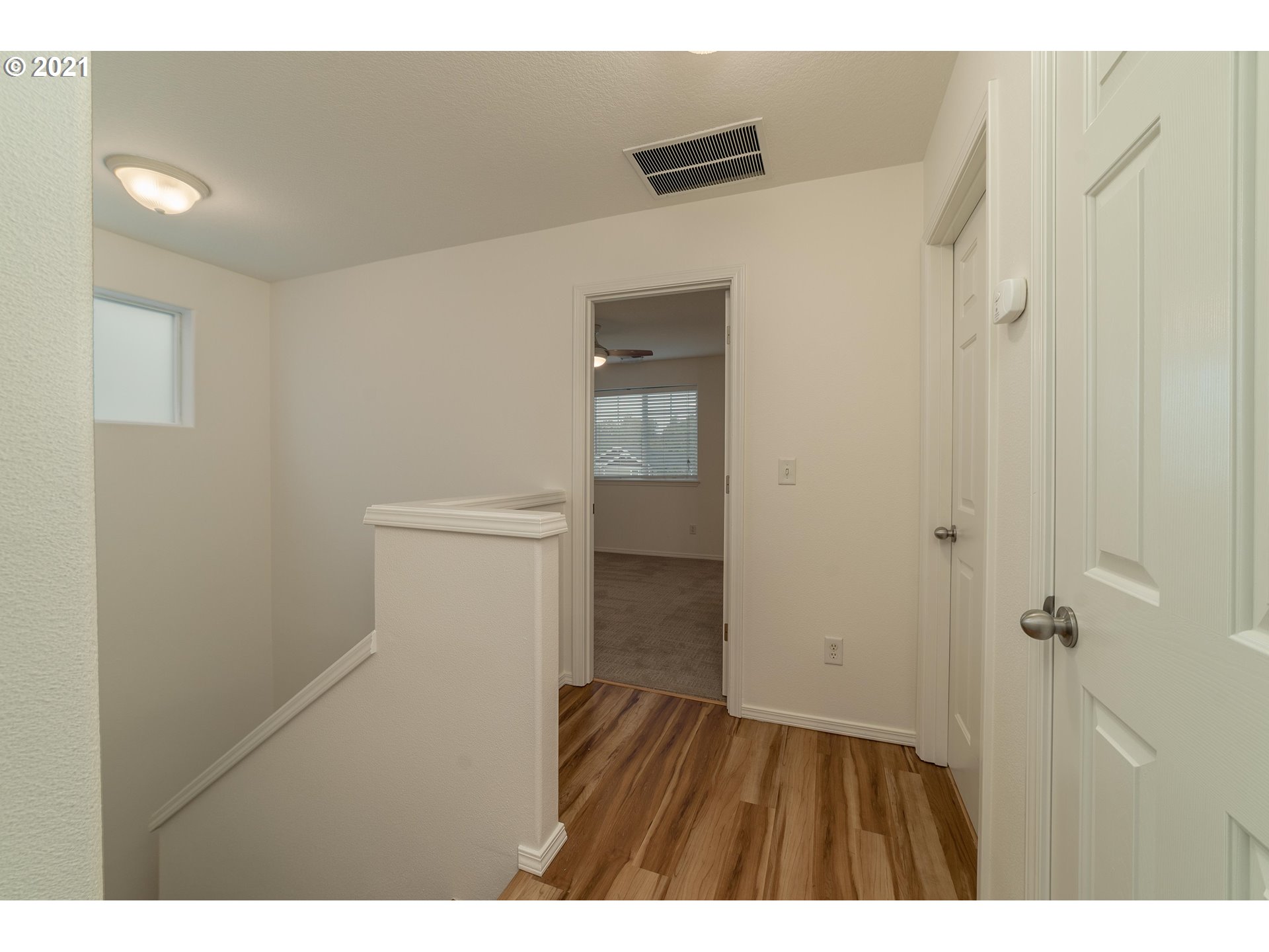 3956 Northwest 12th Avenue Camas, WA 98607 - Photo 26 of 30 a view of hallway with wooden floor