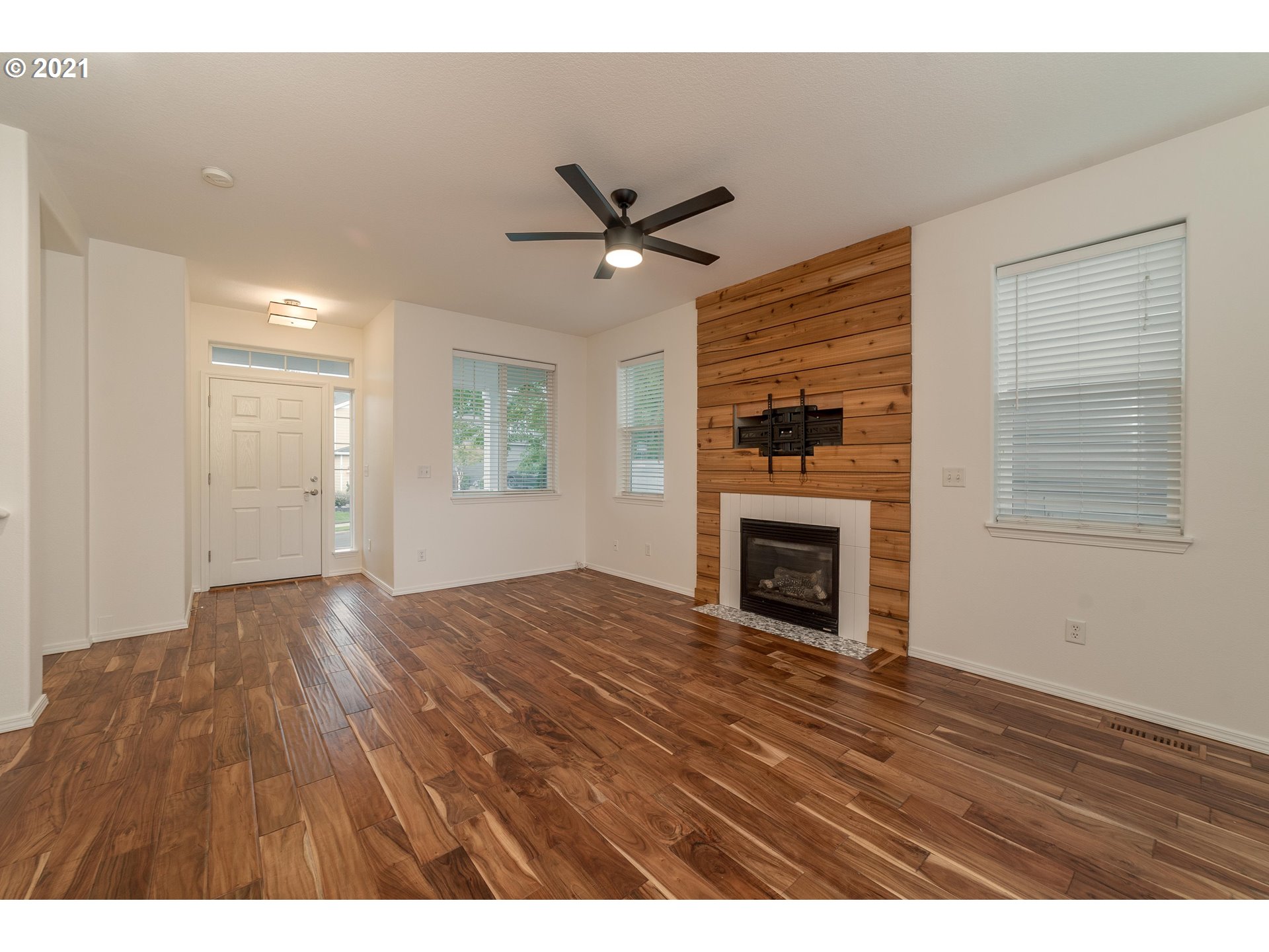 3956 Northwest 12th Avenue Camas, WA 98607 - Photo 4 of 30 a view of empty room with fireplace and windows