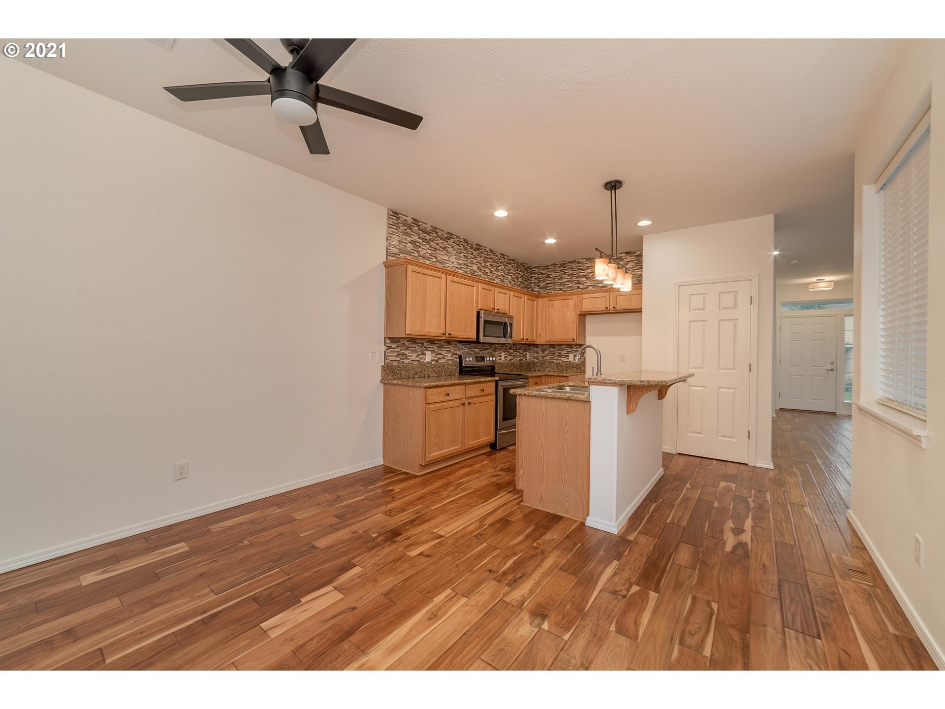 3956 Northwest 12th Avenue Camas, WA 98607 - Photo 6 of 30 a view of kitchen with wooden floor