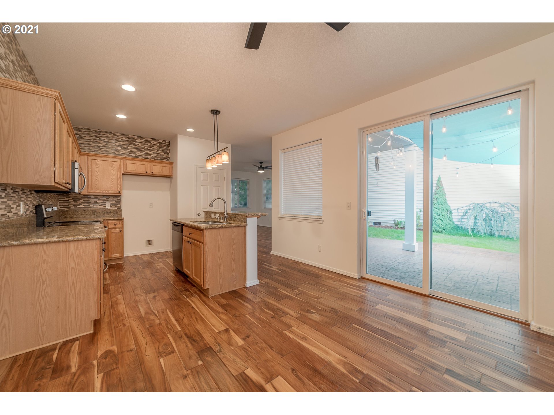 3956 Northwest 12th Avenue Camas, WA 98607 - Photo 7 of 30 a view of kitchen with wooden floor