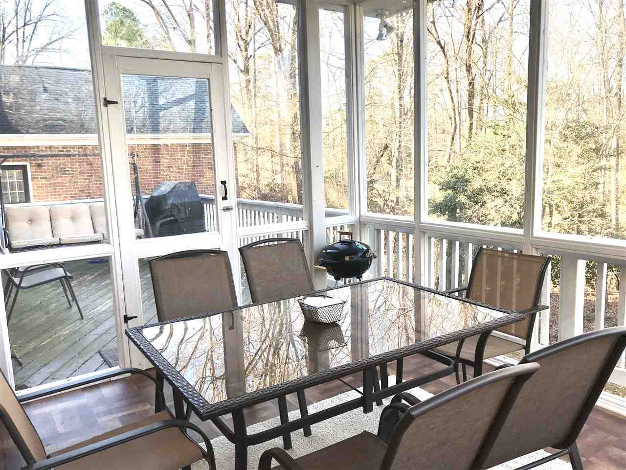 2913 Elmfield Street Raleigh, NC 27614 - Photo 30 of 30 Large deck with open area and enclosed space with amazing wooded views of TPC Wakefield Deck/Patio