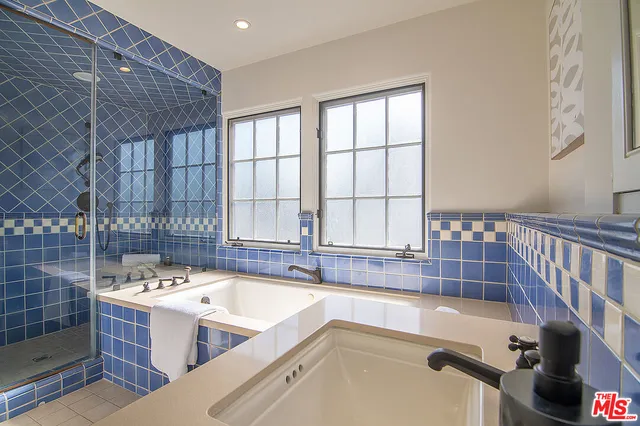 a bathroom with a sink and a bathtub