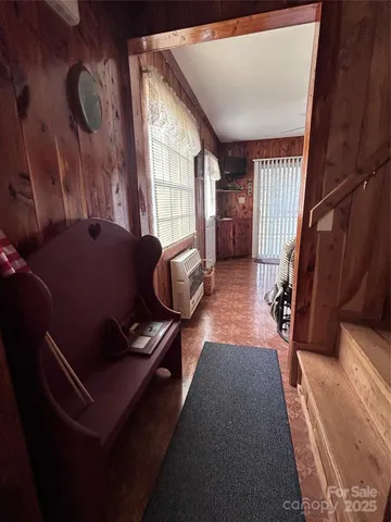 a bedroom with a bed and a table