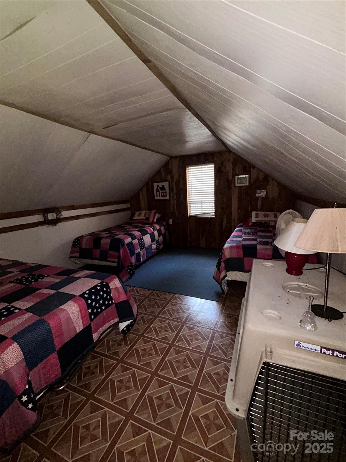 362 Melton Branch Road, Unit A1A6 Bakersville, NC 28705 - Photo 20 of 30 a living room with furniture and a chair