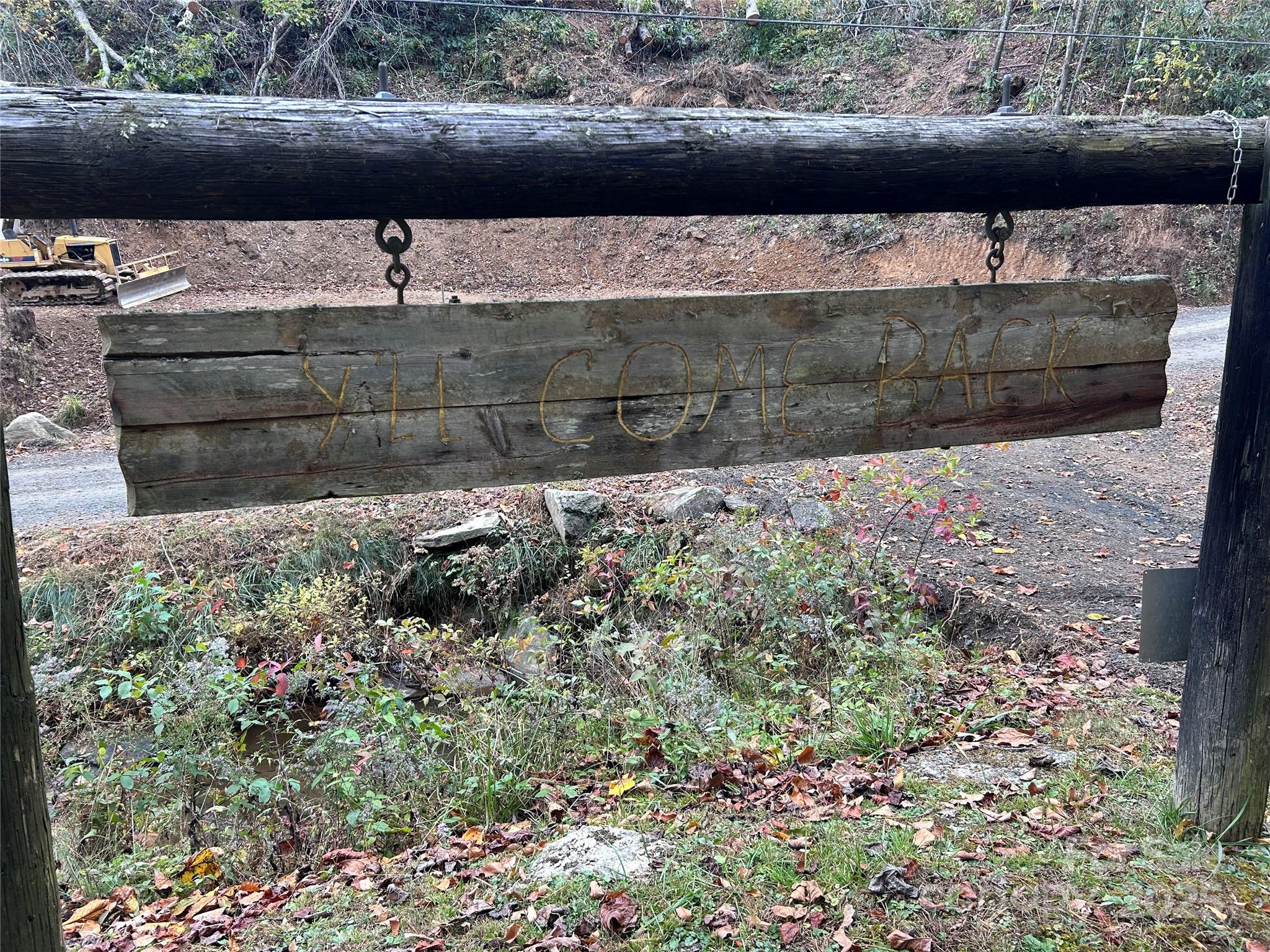 362 Melton Branch Road, Unit A1A6 Bakersville, NC 28705 - Photo 26 of 30 a view of a yard with an outdoor space