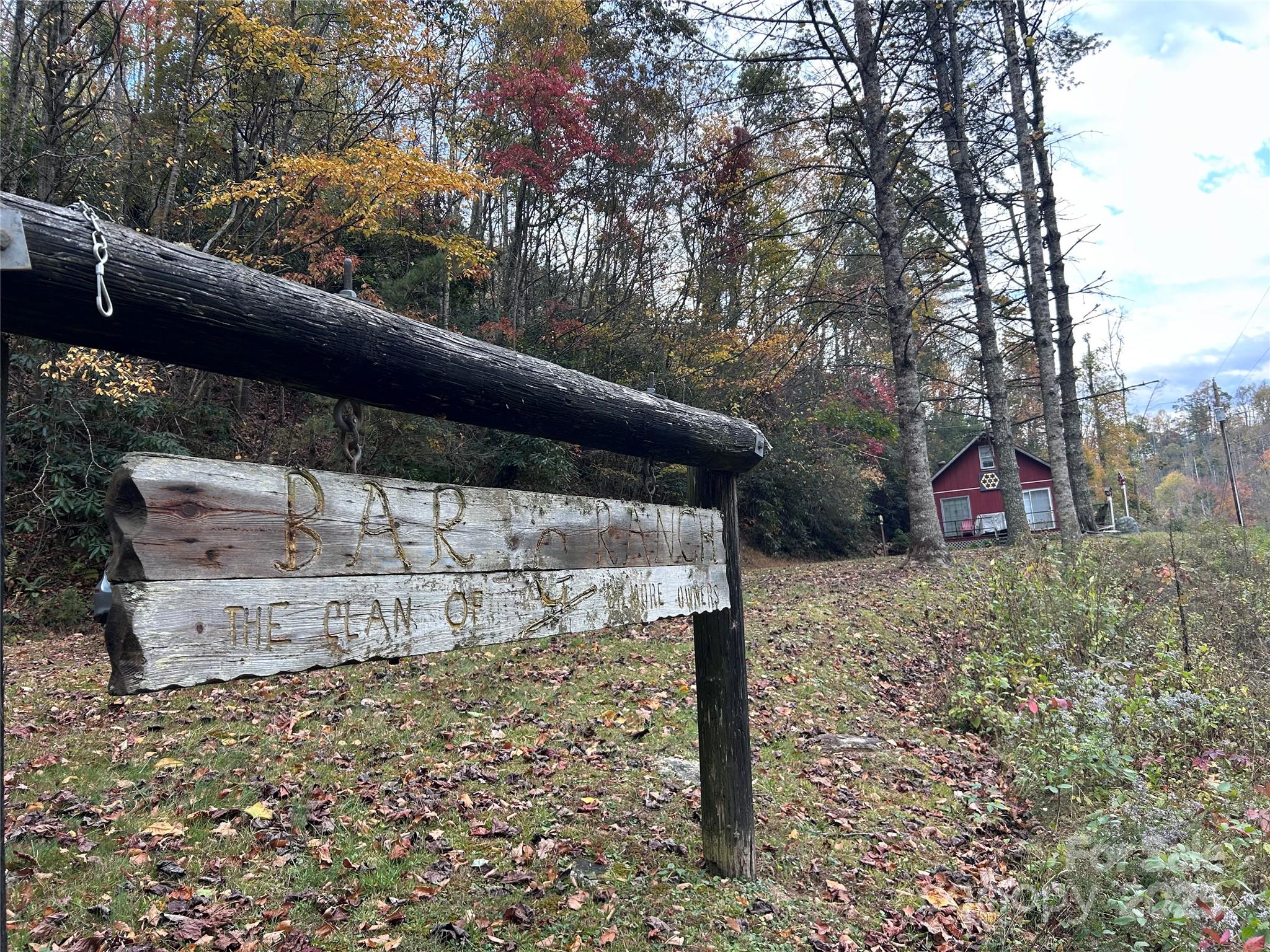 362 Melton Branch Road, Unit A1A6 Bakersville, NC 28705 - Photo 27 of 30 a view of a bench in the backyard