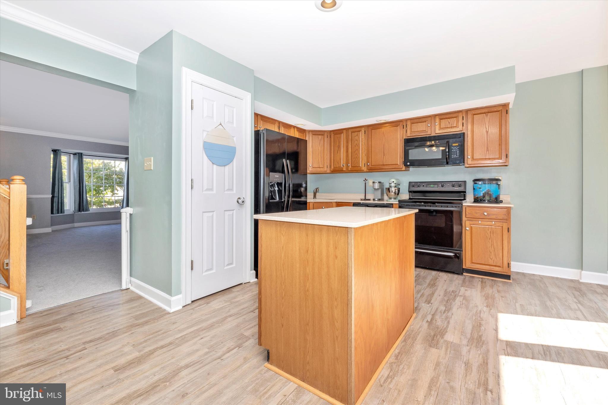 5587 Rivendell Place Frederick, MD 21703 - Photo 8 of 26 Island, LVP Flooring