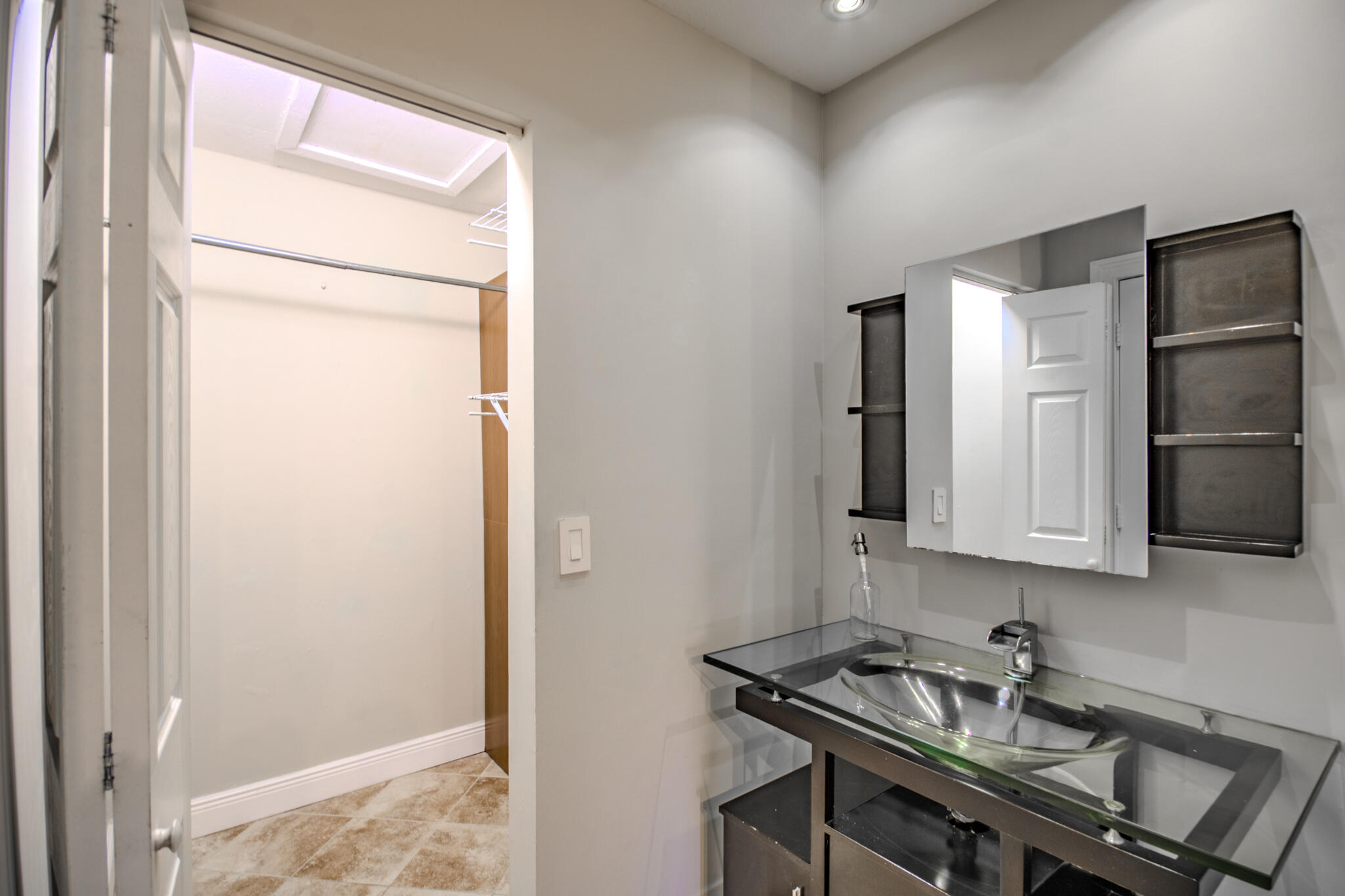 427 Cottonwood Place Boca Raton, FL 33431 - Photo 12 of 30 a room with a sink and a window