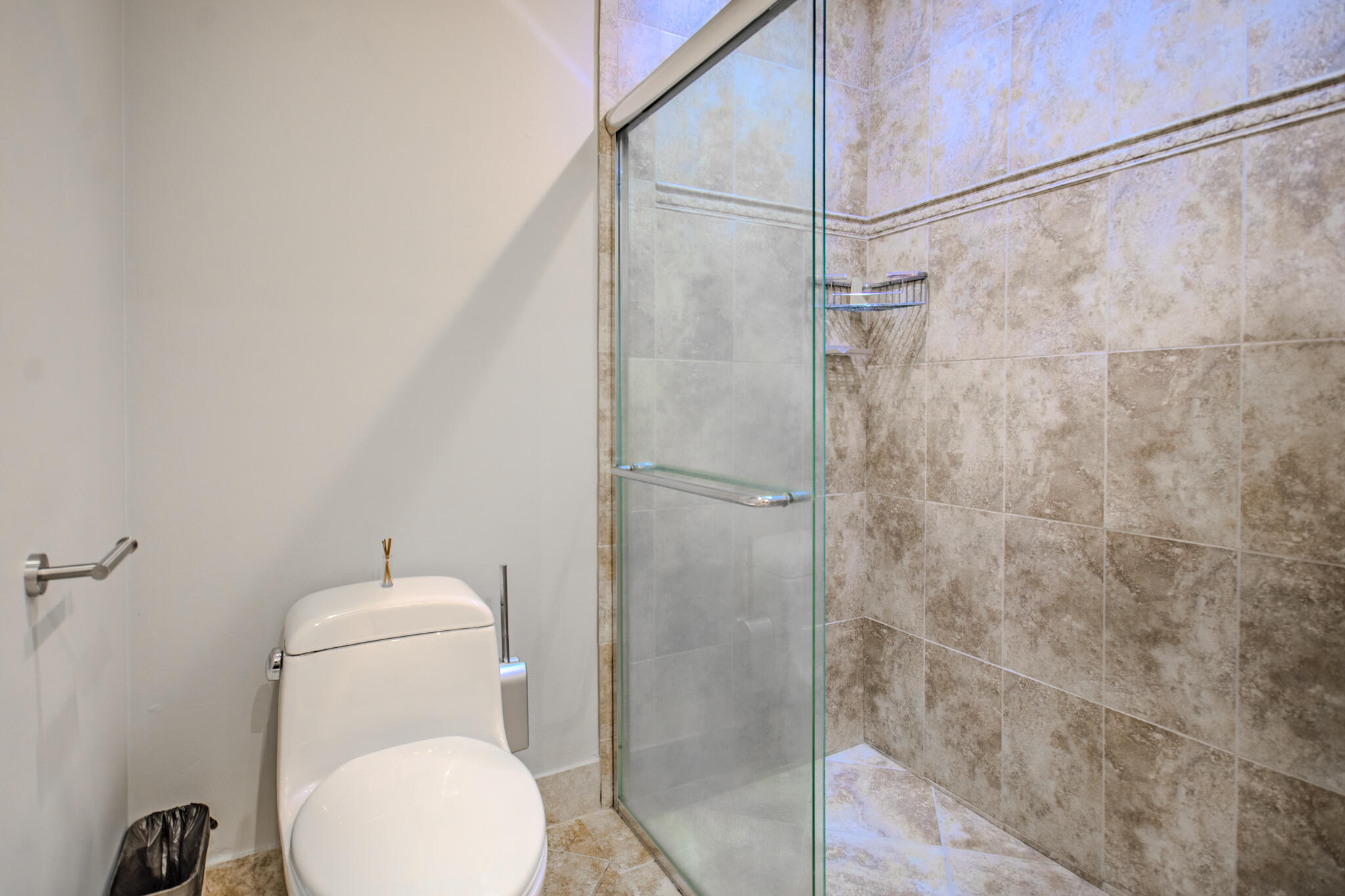 427 Cottonwood Place Boca Raton, FL 33431 - Photo 13 of 30 a bathroom with a toilet and a shower