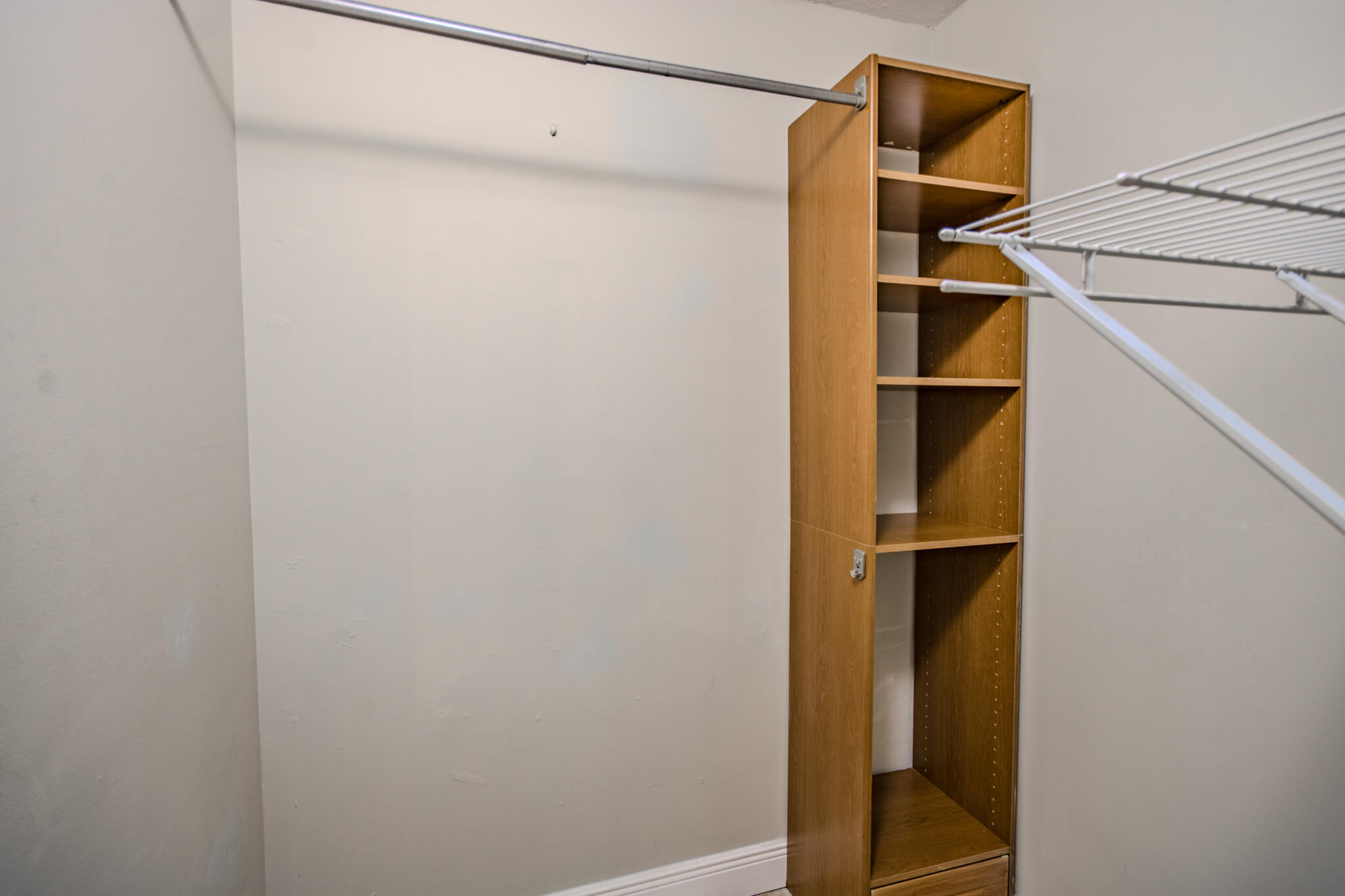 427 Cottonwood Place Boca Raton, FL 33431 - Photo 14 of 30 a view of walk in closet with clothes