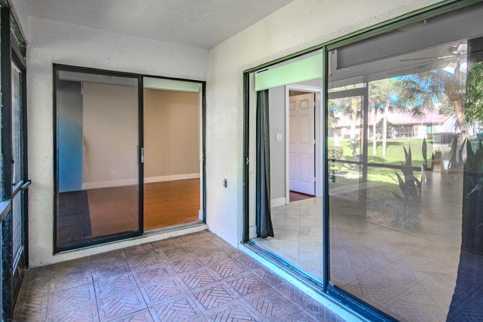 427 Cottonwood Place Boca Raton, FL 33431 - Photo 15 of 30 an empty room and sliding glass door