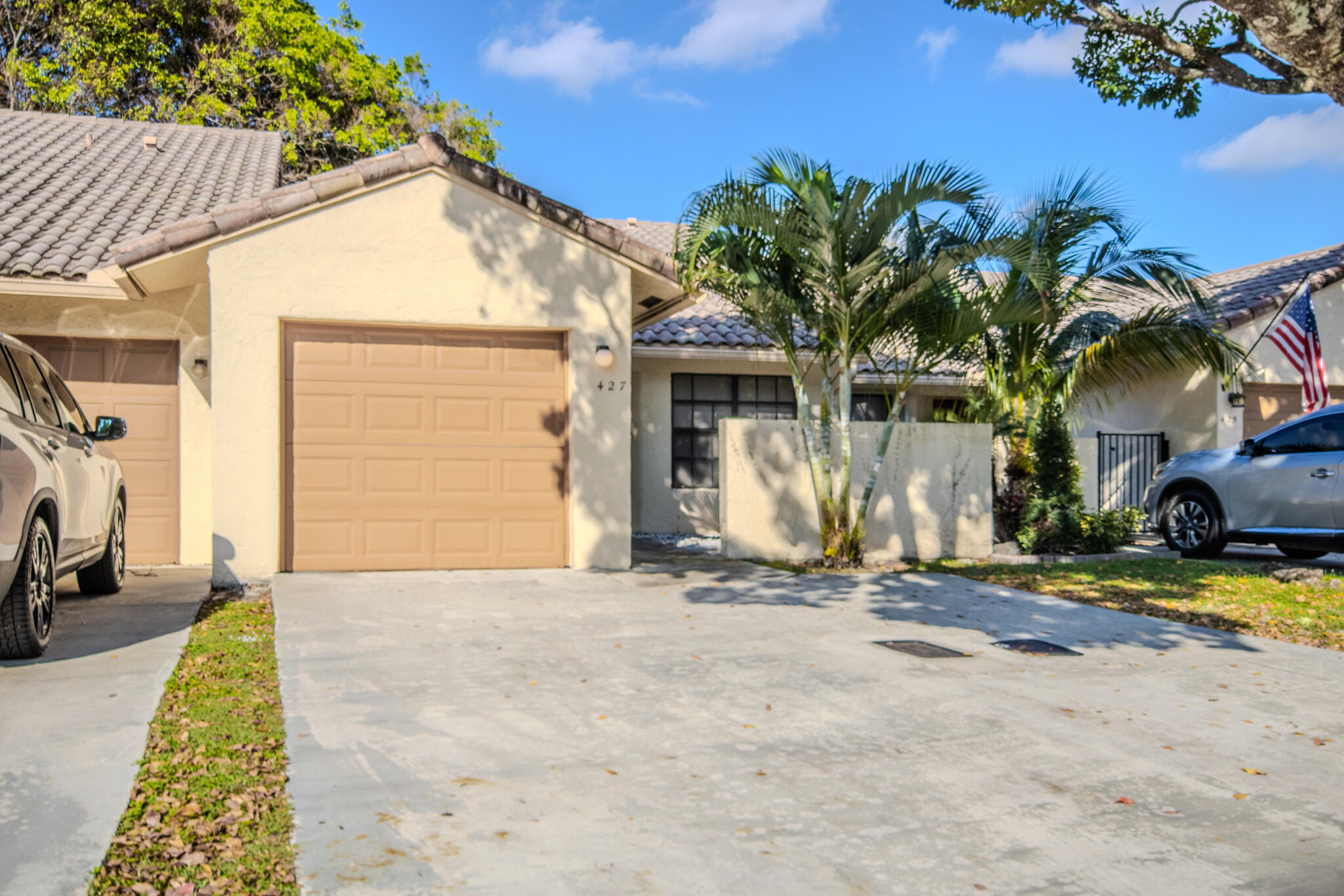 427 Cottonwood Place Boca Raton, FL 33431 - Photo 2 of 30 a view of a house with a patio