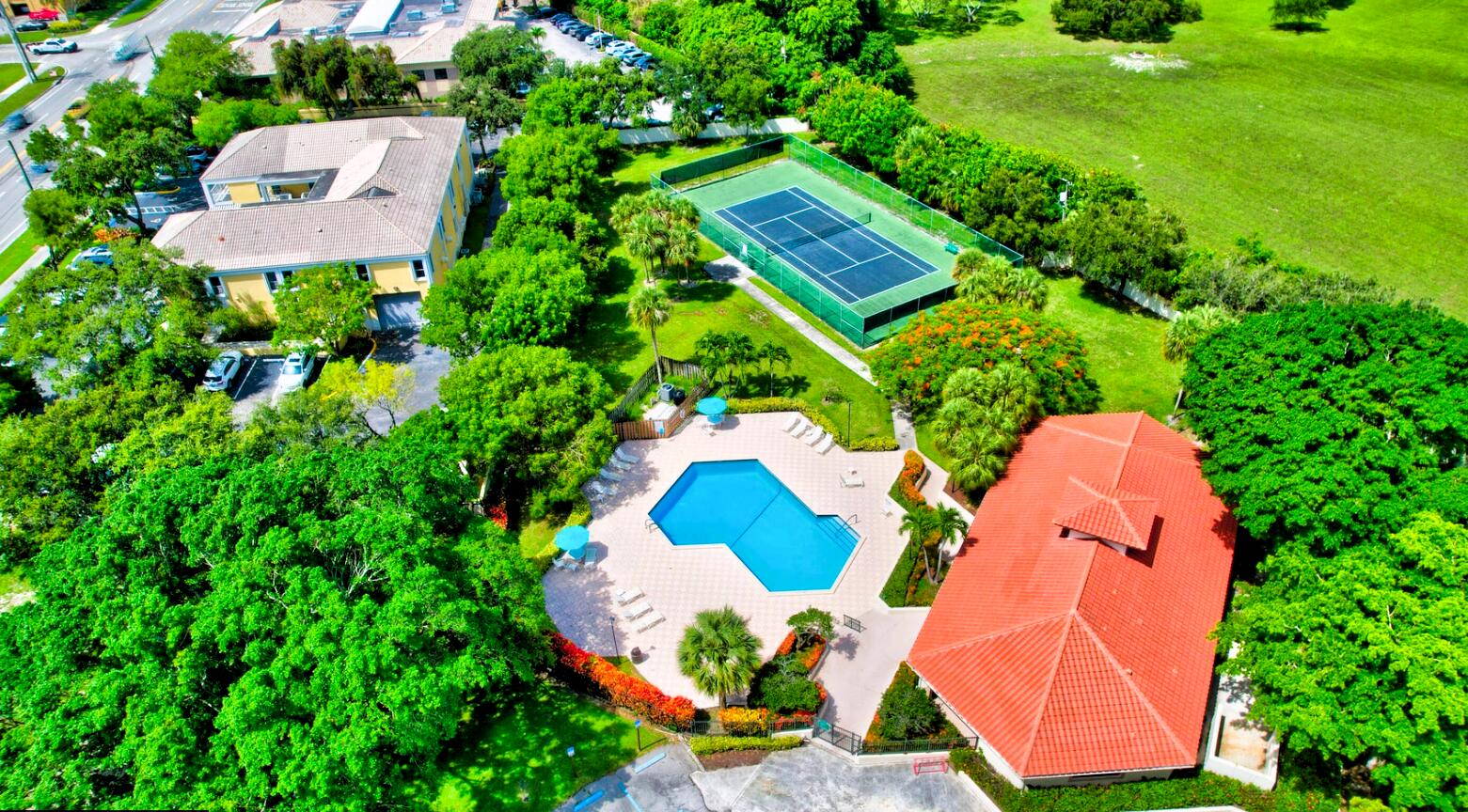 427 Cottonwood Place Boca Raton, FL 33431 - Photo 26 of 30 an aerial view of a house with a yard and garden