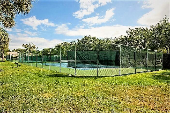 427 Cottonwood Place Boca Raton, FL 33431 - Photo 27 of 30 a view of a park with a large tree