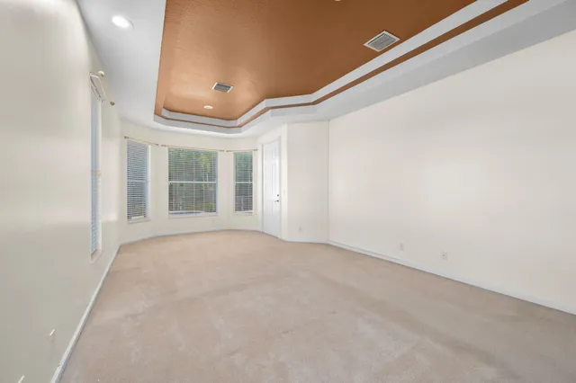 a view of empty room with windows