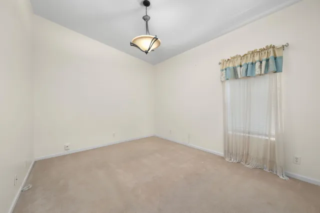 a view of livingroom with furniture and window