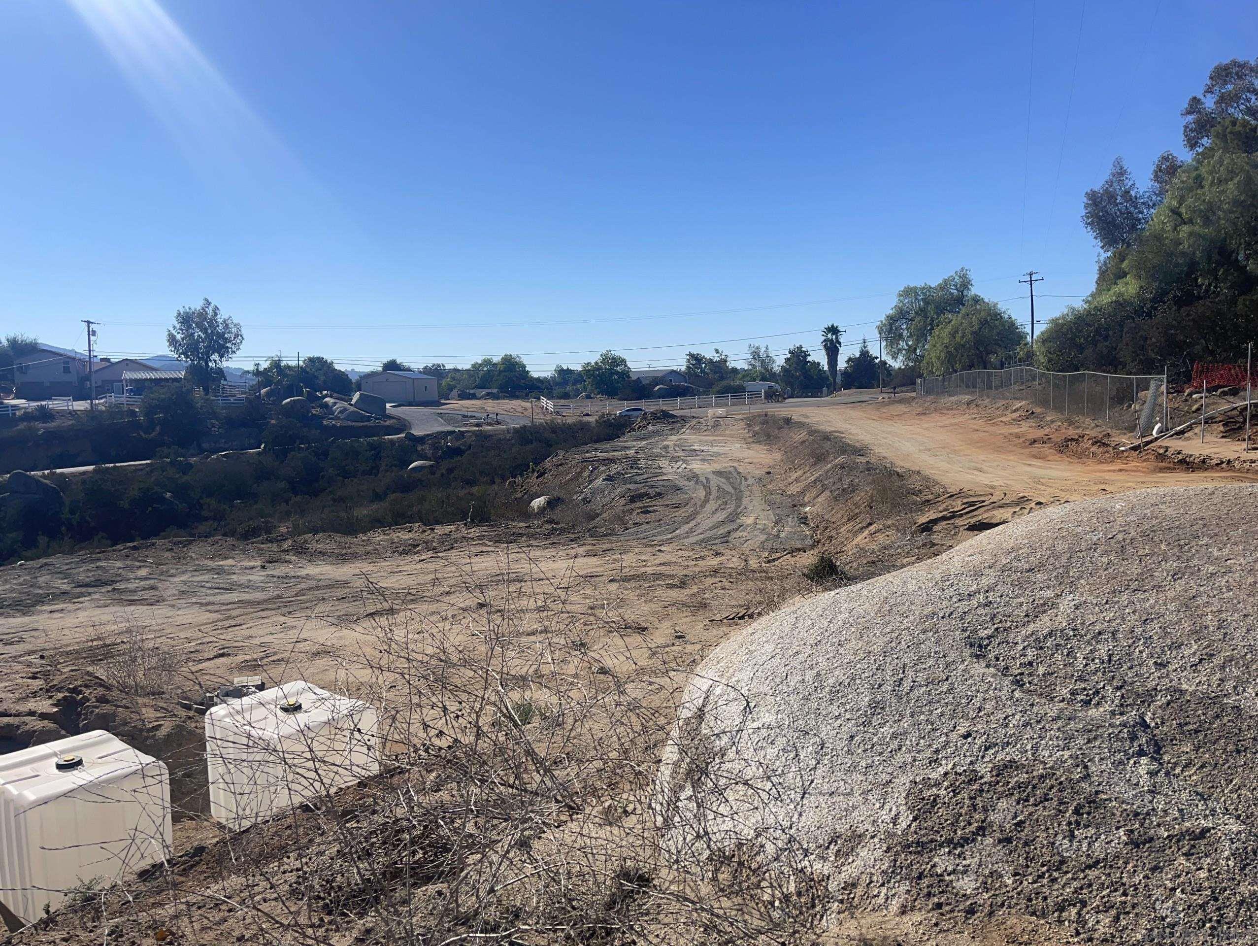 0 Miller Road Valley Center, CA 92082 - Photo 4 of 19 a view of a dry yard with wooden fence