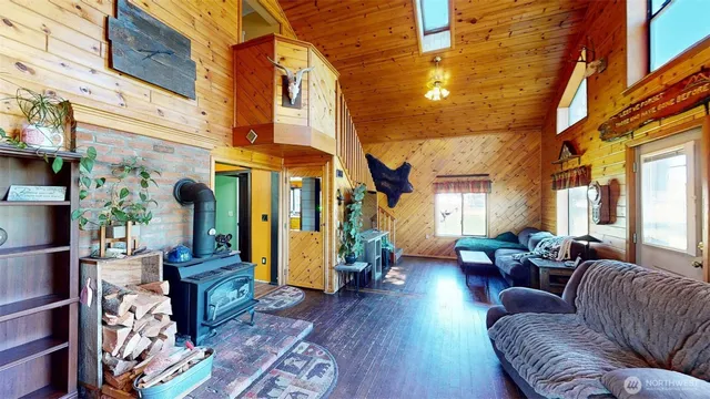 a very nice looking living room with a large window