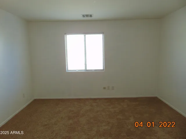 a kitchen with a sink stove and microwave