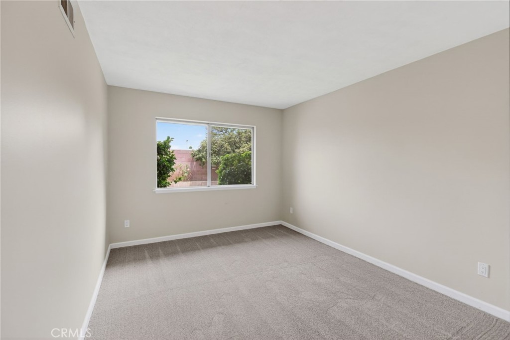 4963 Carlingford Avenue Riverside, CA 92504 - Photo 24 of 33 an empty room with windows