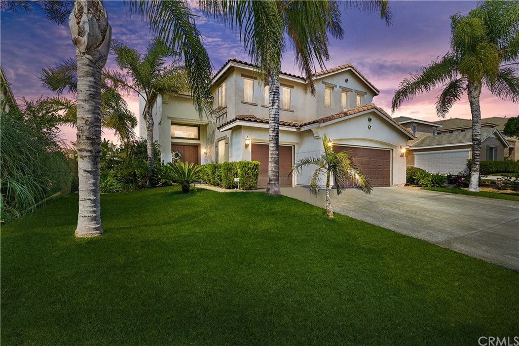 20110 Dayton Street Riverside, CA 92508 - Photo 1 of 1 a view of a big yard with palm trees