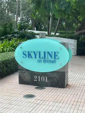 a view of outdoor space with a garden and trees