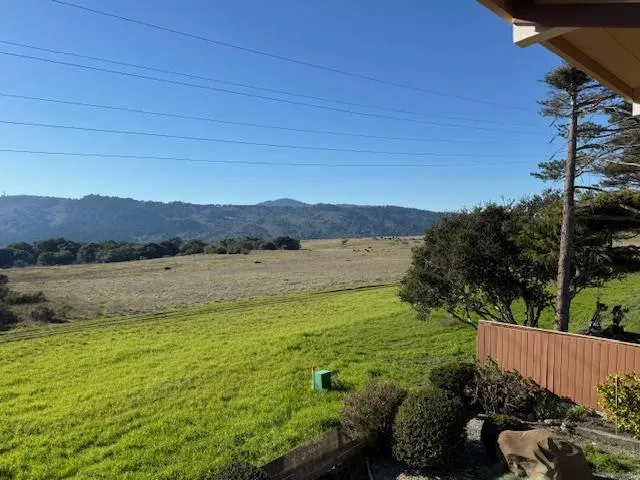 a view of lake and mountain
