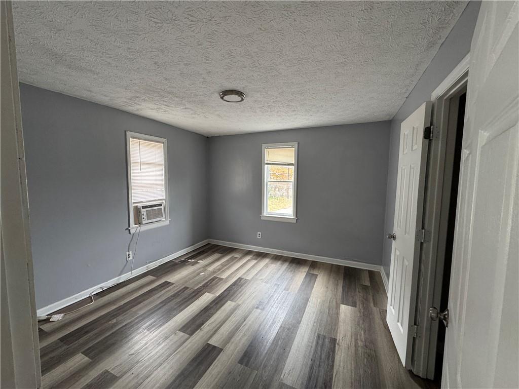 1410 Cave Spring Road Southwest Rome, GA 30161 - Photo 8 of 13 a view of an empty room and window