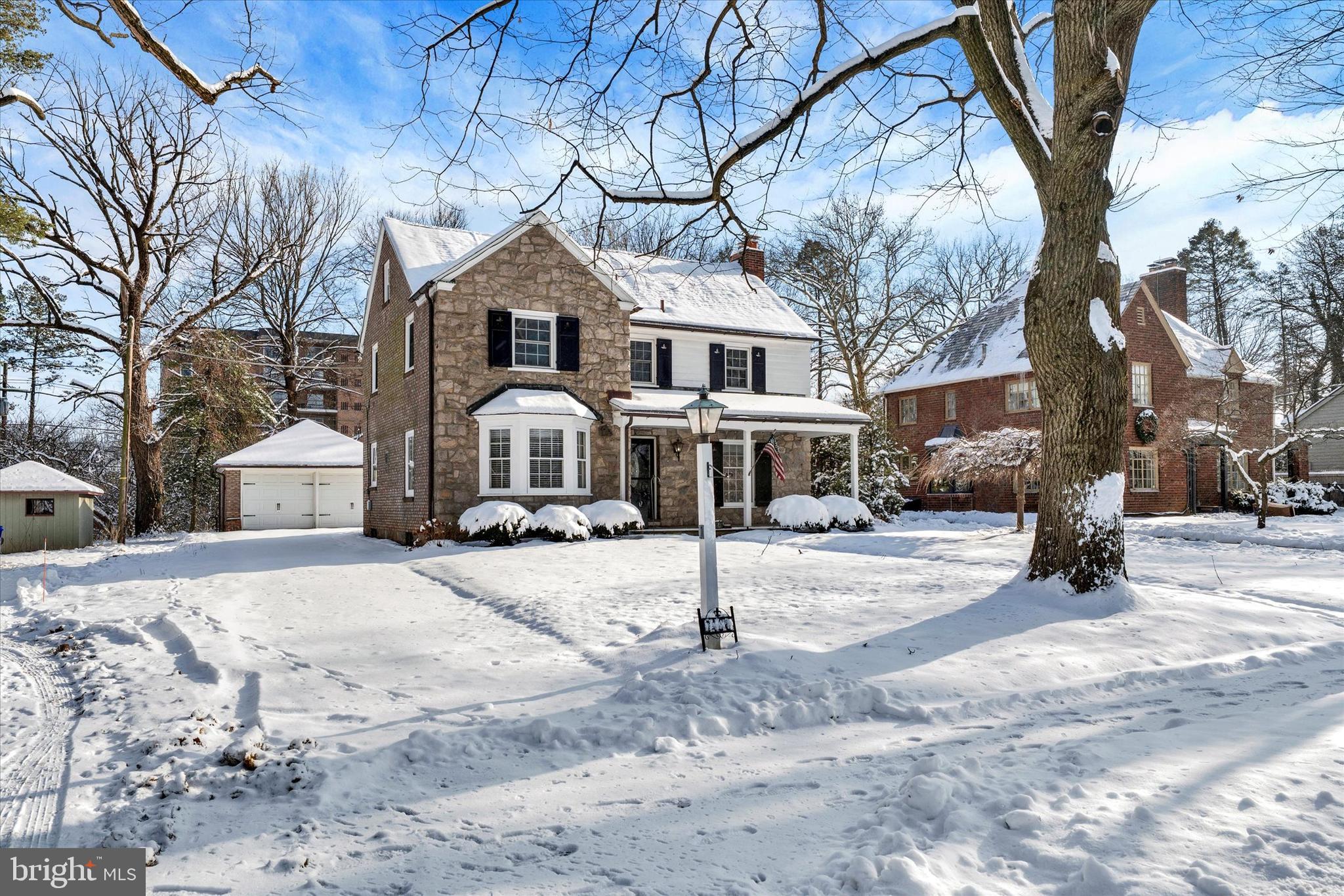 1406 Farr Road Reading, PA 19611 - Photo 2 of 29 a front view of a house with a yard covered in snow