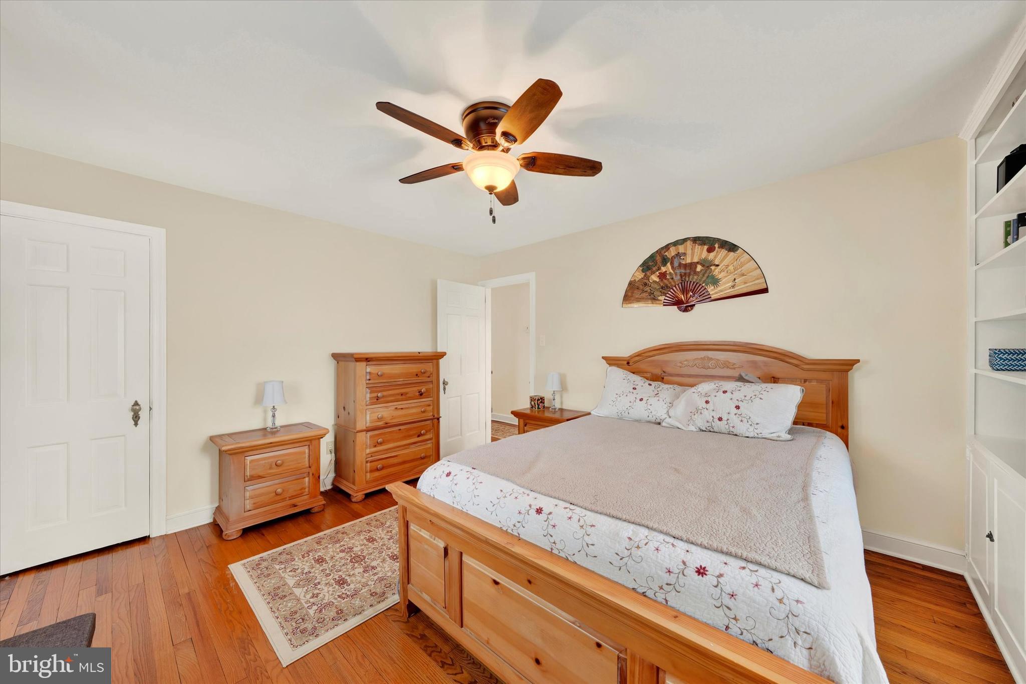 1406 Farr Road Reading, PA 19611 - Photo 23 of 29 a bedroom with a bed and a chandelier