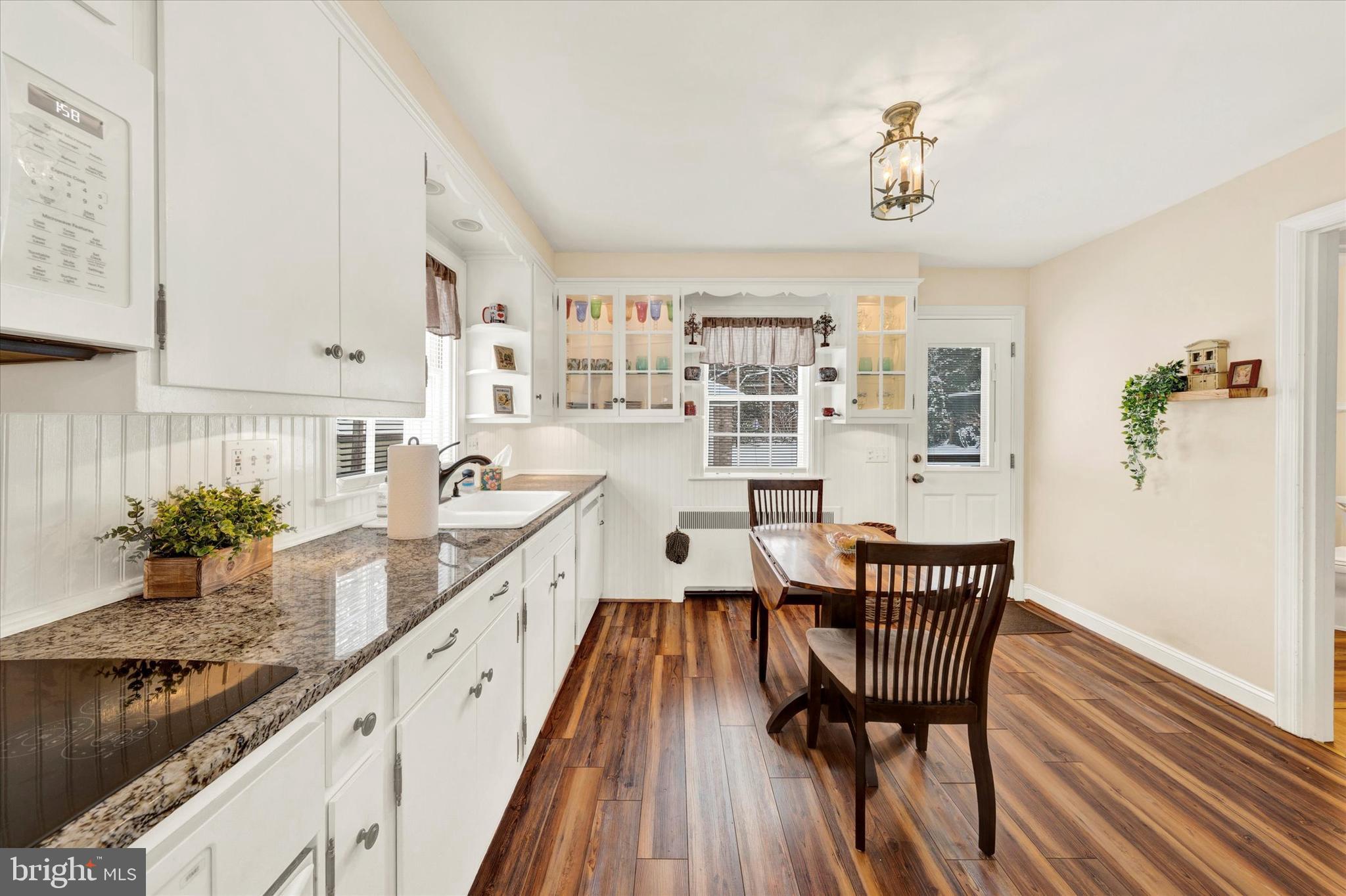 1406 Farr Road Reading, PA 19611 - Photo 9 of 29 a kitchen with granite countertop lots of counter top space and wooden floor