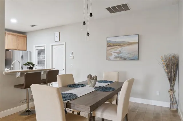 a view of a dining room with furniture