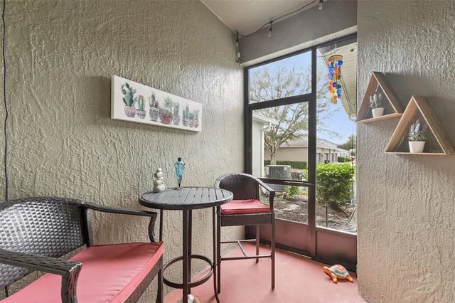 a view of a livingroom with furniture and window