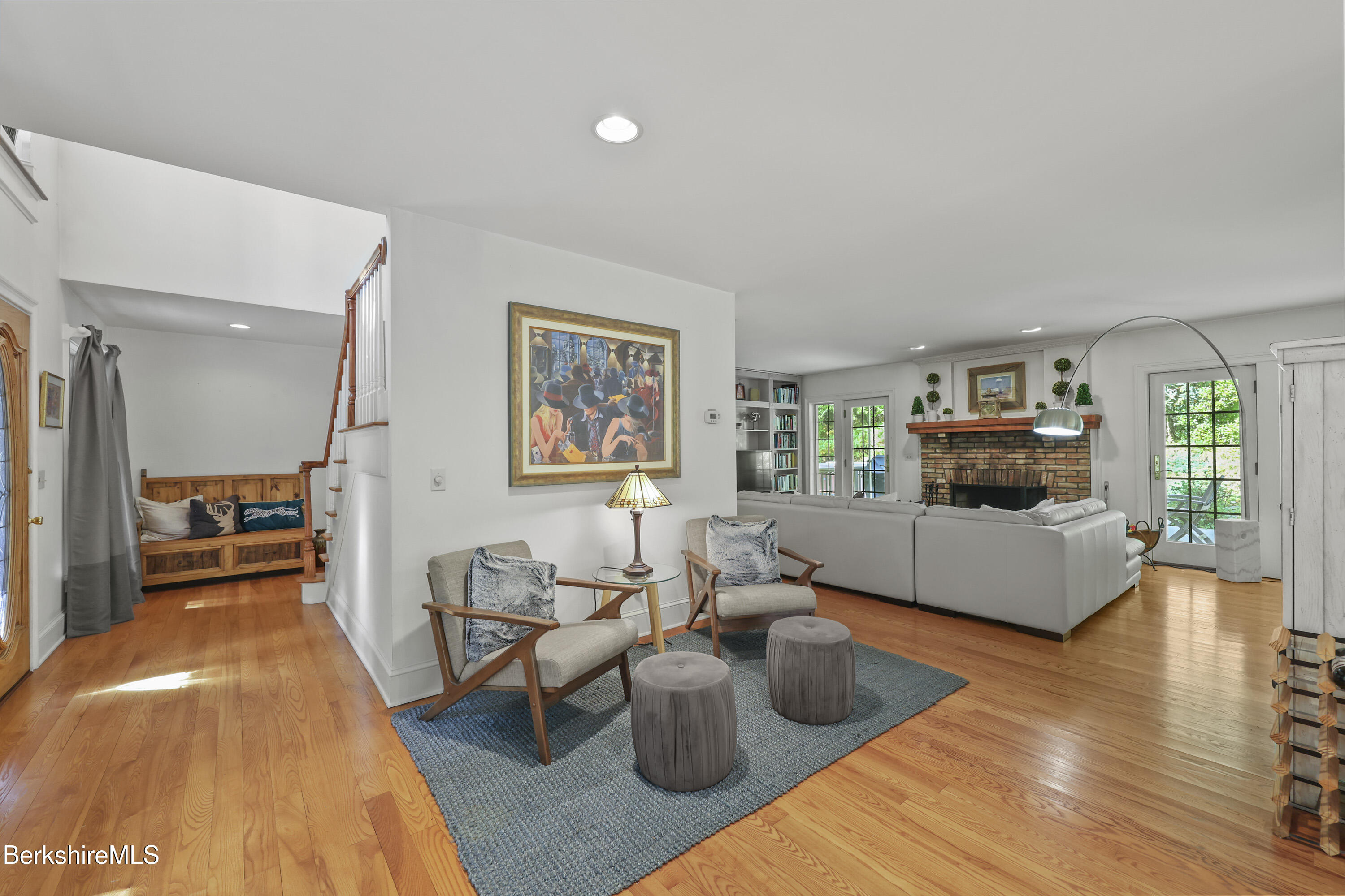905 W Road Sheffield, MA 01230 - Photo 14 of 60 a living room with furniture and a wooden floor