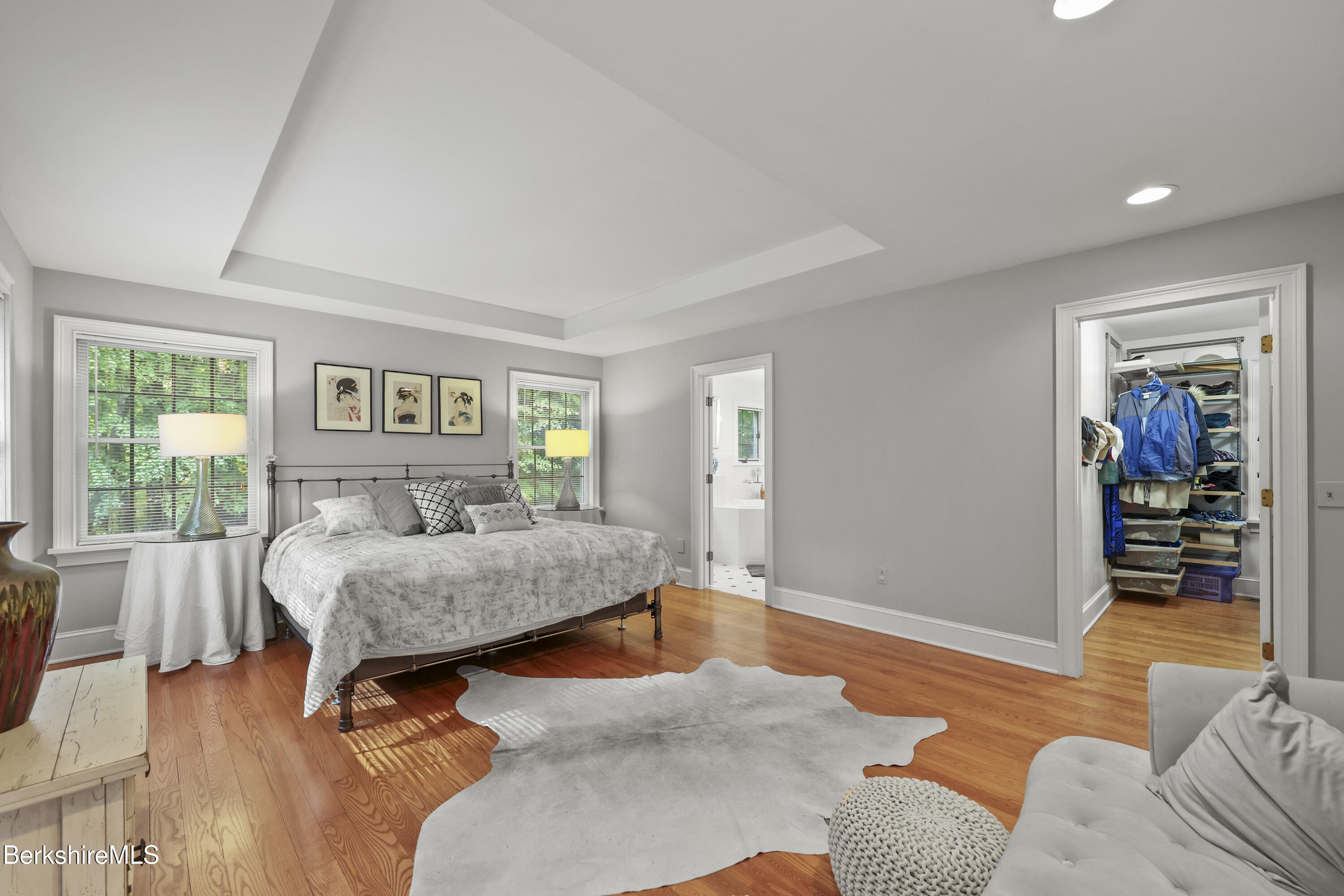 905 W Road Sheffield, MA 01230 - Photo 26 of 60 a bedroom with a bed and wooden floor