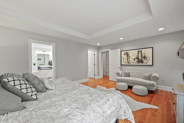 a bathroom with a bathtub and a sink